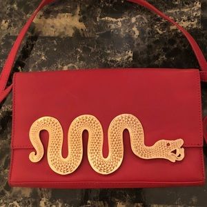 Jonathan Adler 2 n 1 clutch with removable strap